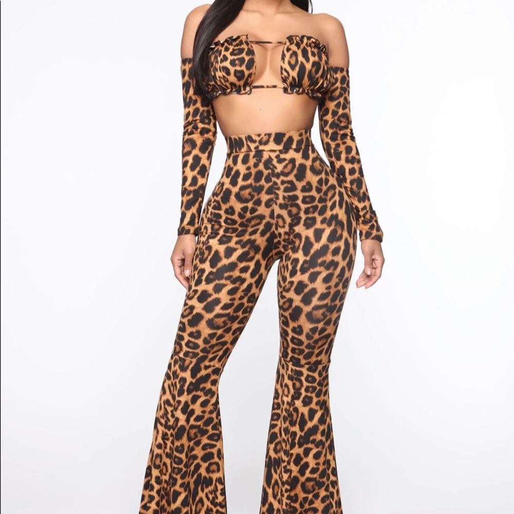 Two-piece cheetah print set. Flared bottoms
